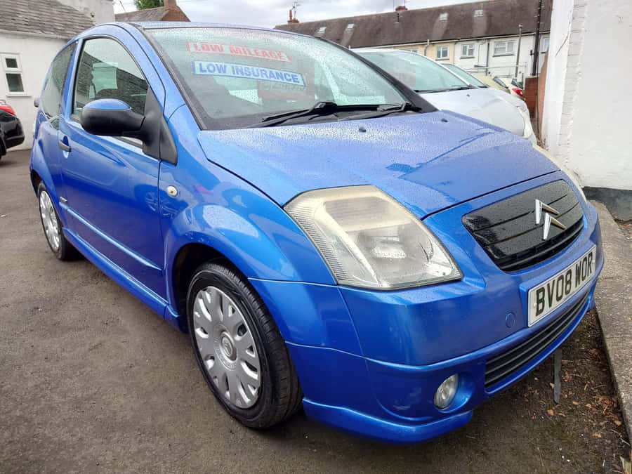 Blue Citroen C2 Parked Outdoors Wallpaper