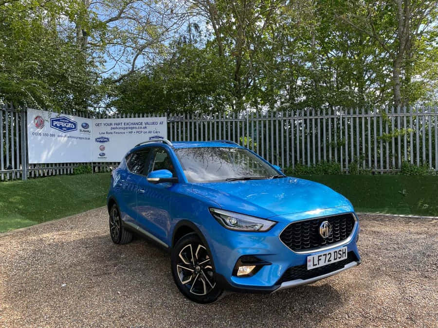 Blue M G H S Parked Outdoors2023 Wallpaper