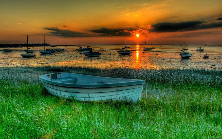 Boat On Green Grass Wallpaper