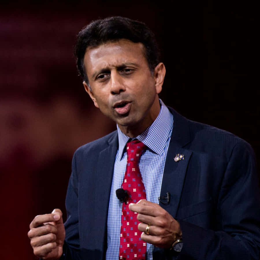 Bobby Jindal Answering A Question At A Press Conference Wallpaper