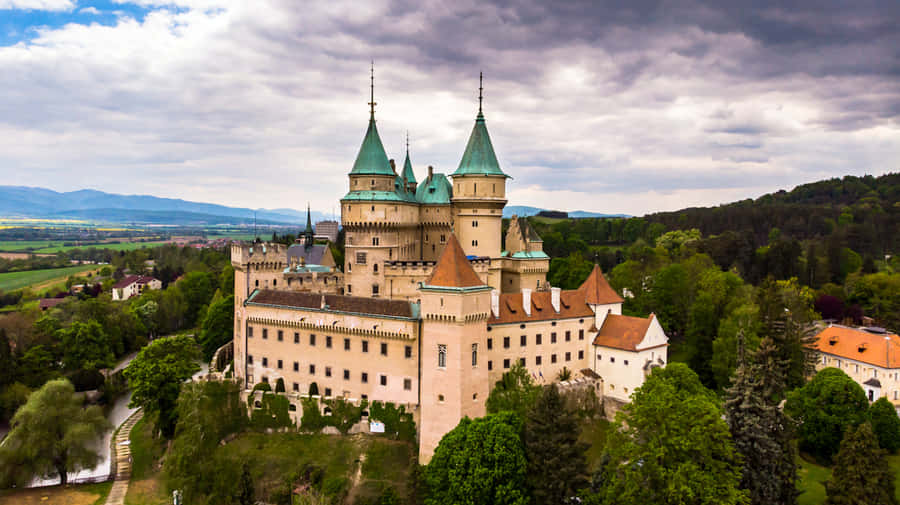 Bojnice Castle Beneath Blue Cloudy Sky Wallpaper