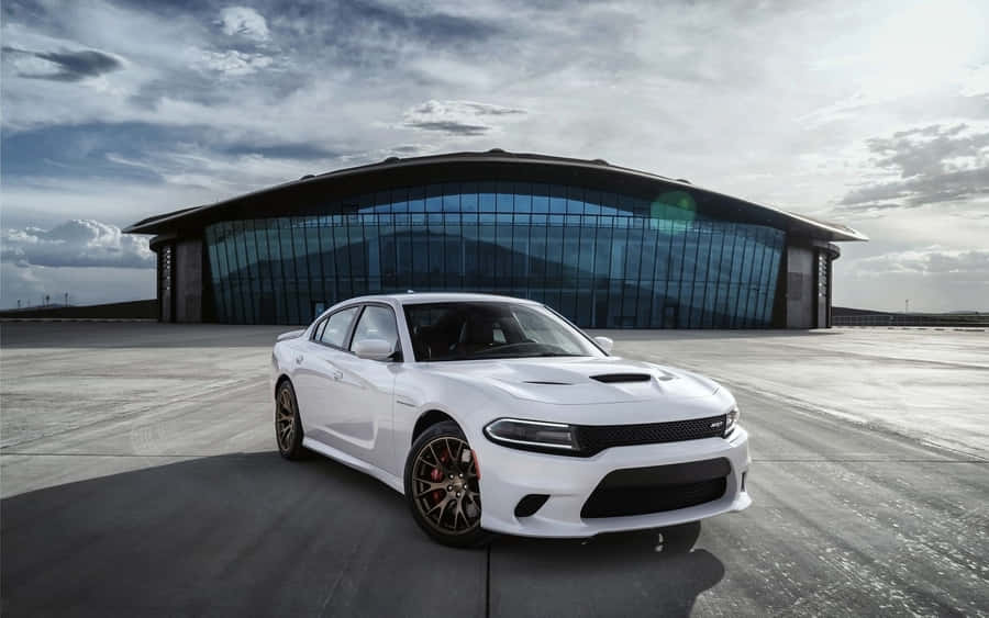 Bold And Powerful - Dodge Charger In Action Wallpaper