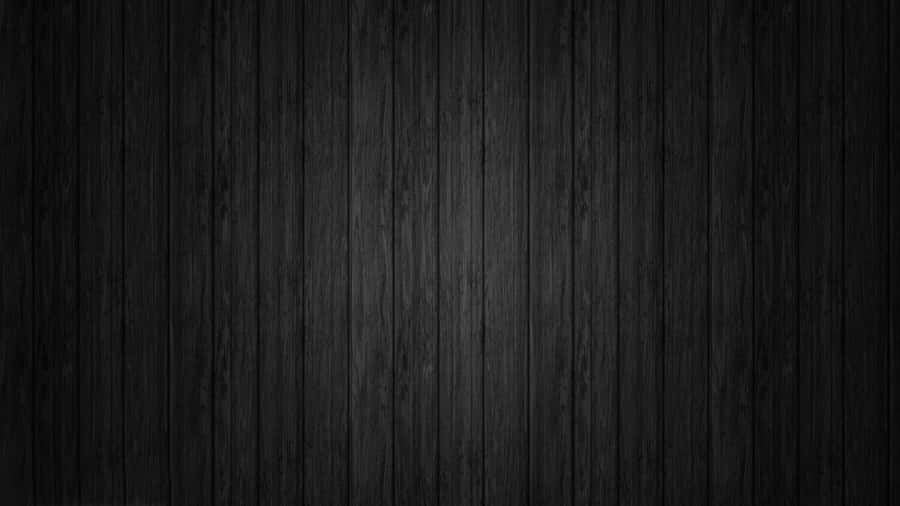 Bold, Stylish Black Carbon Fiber Wallpaper