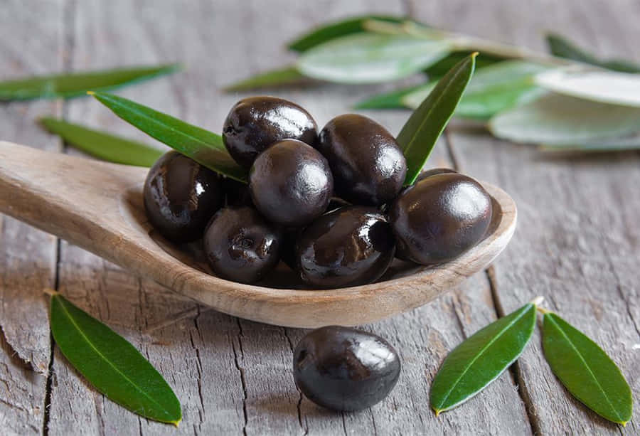 Bowl Of Fresh Black Olives Wallpaper