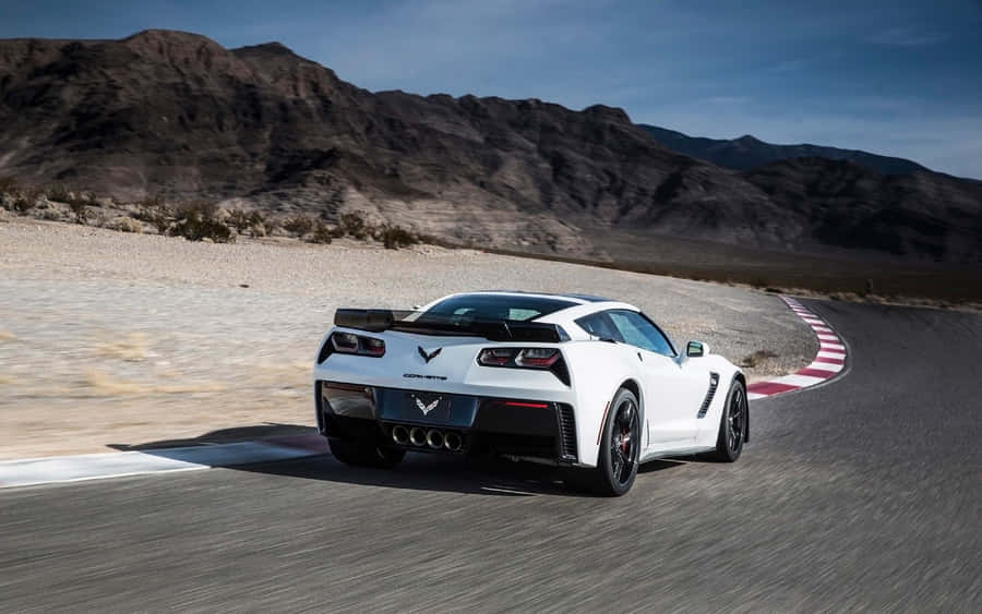 Breathtaking Chevrolet Corvette Z06 In Action Wallpaper