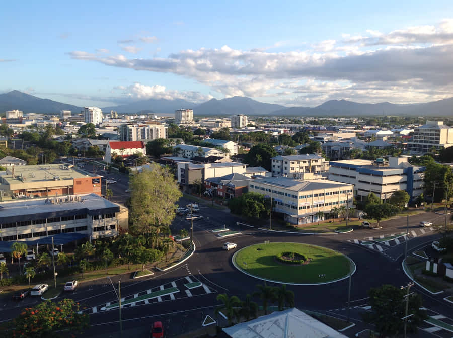Breathtaking View Of Cairns Beach At Sunset Wallpaper