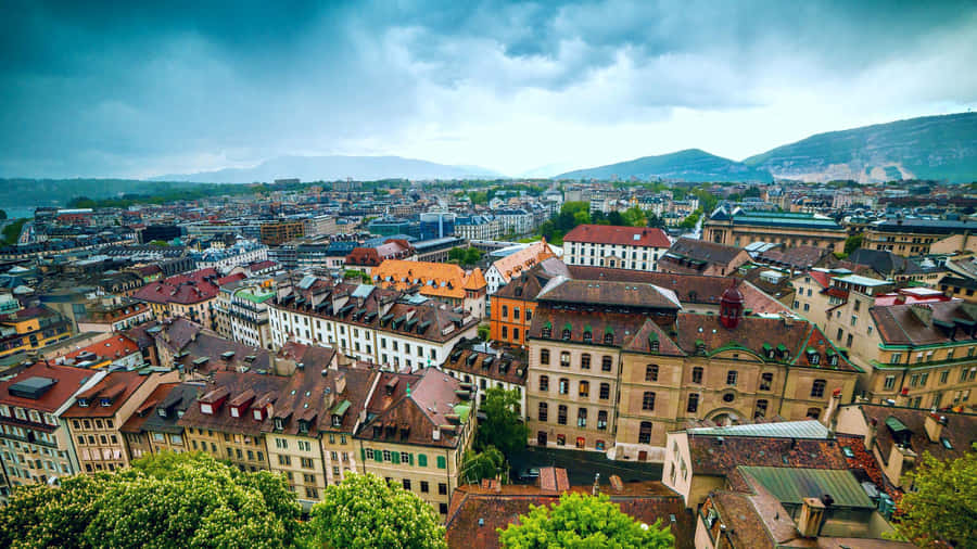 Breathtaking View Of The Picturesque Carouge At Sunset Wallpaper