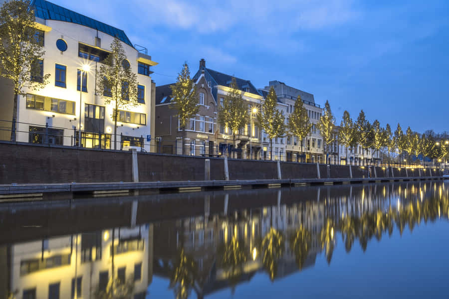 Breda Evening Riverside View Wallpaper