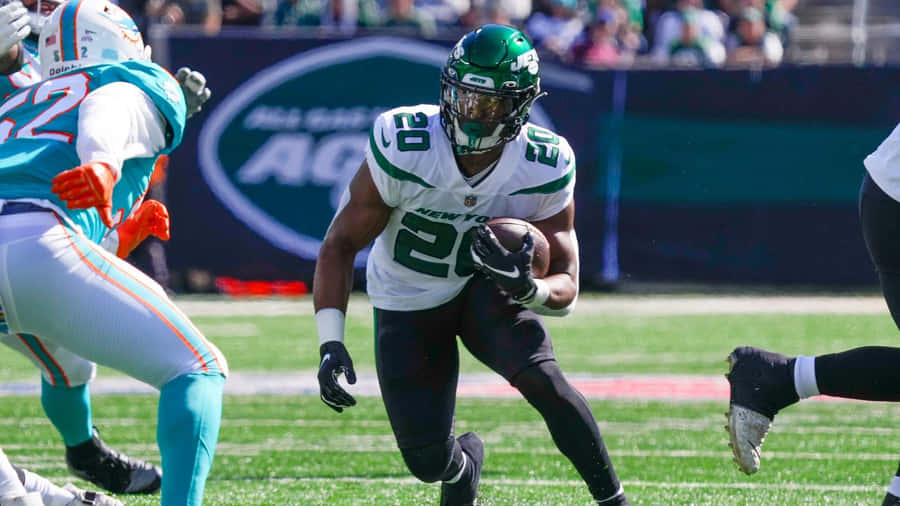 Breece Hall New York Jets Running Action Wallpaper