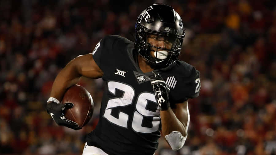 Breece Hall Running Back Action Wallpaper