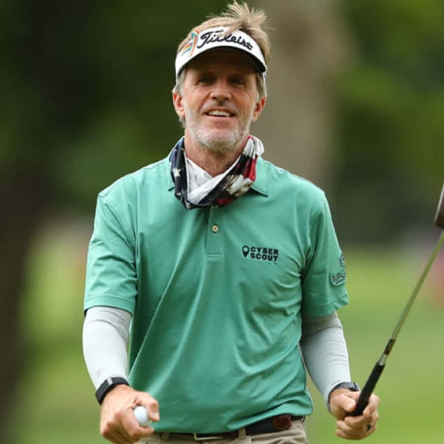 Brett Quigley Club And Ball In Hand Wallpaper