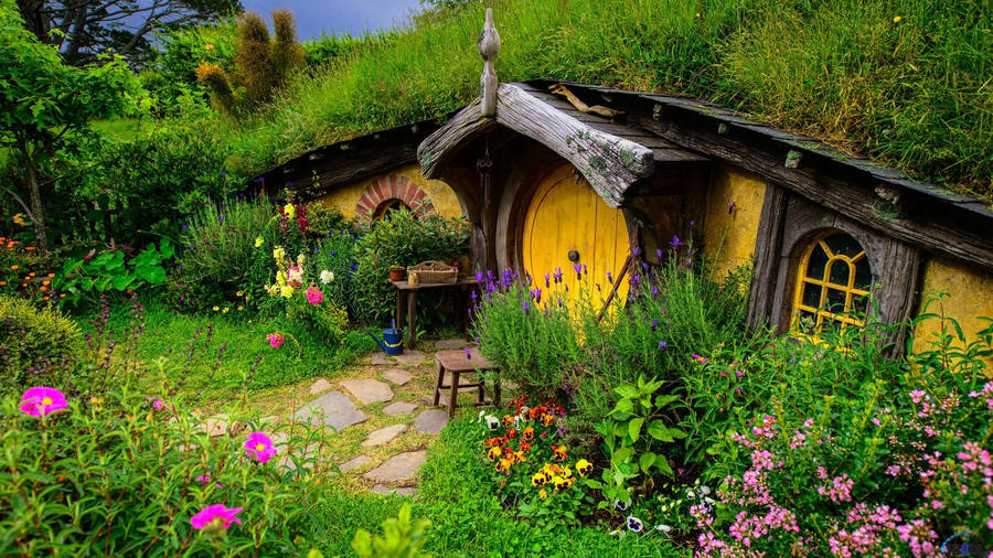 Bright And Cosy Yellow Hobbit House Wallpaper