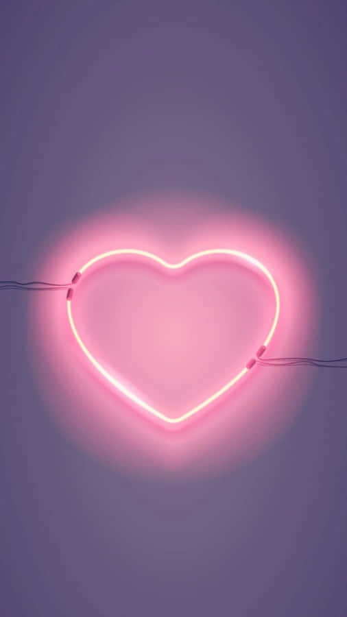 Brighten Up Your Life With An Electrifying Neon Heart! Wallpaper