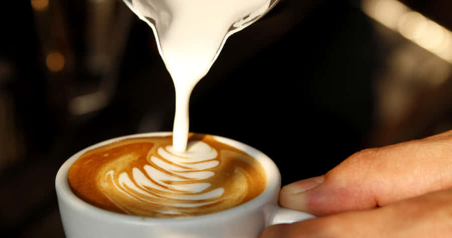 Brightly Lit Cityscape In Night Wallpaper