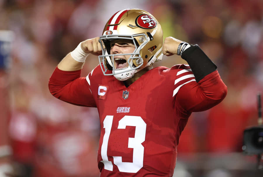 Brock Purdy49ers Quarterback Celebration Wallpaper