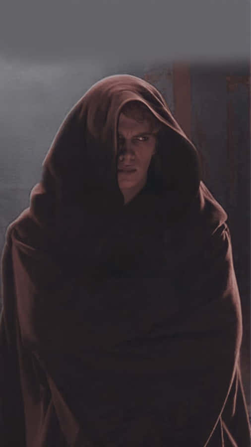 Brooding Figurein Brown Cloak Wallpaper