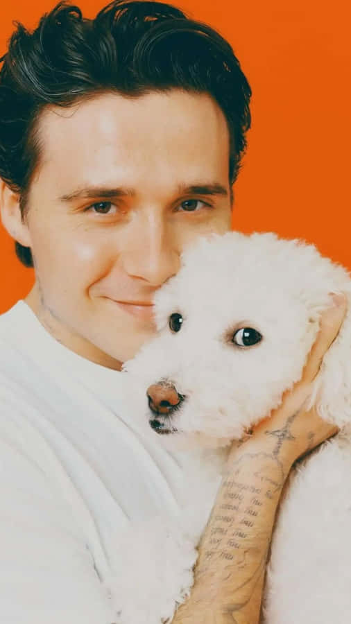 Brooklyn Beckham With Dog Wallpaper