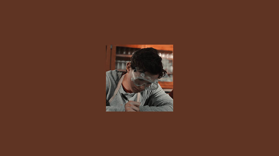 Brown Aesthetic Man With Goggles Laptop Wallpaper