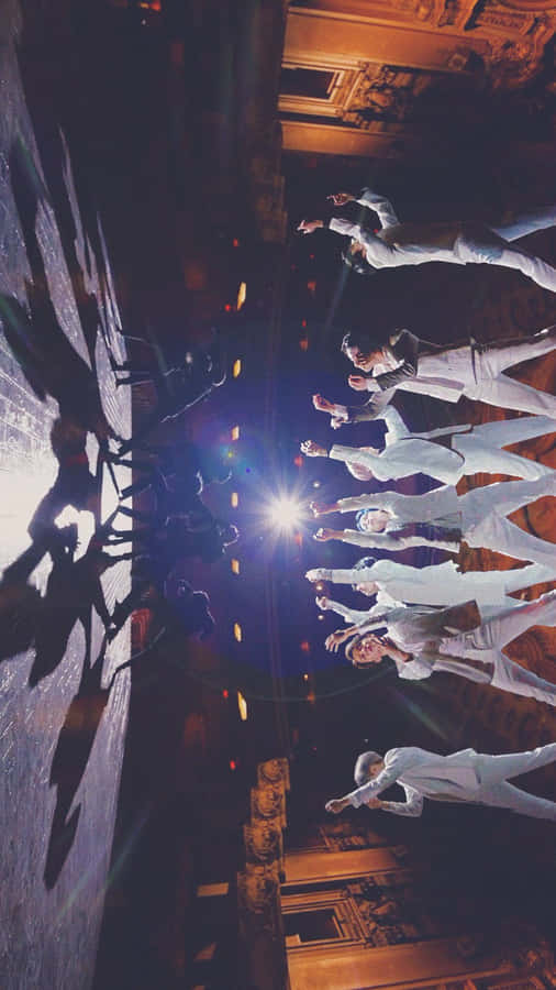 Bts At Their Best In A Stunning Music Video Scene Wallpaper