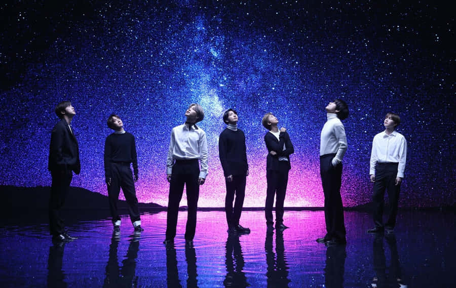 Bts In A Stunning Music Video Scene Wallpaper