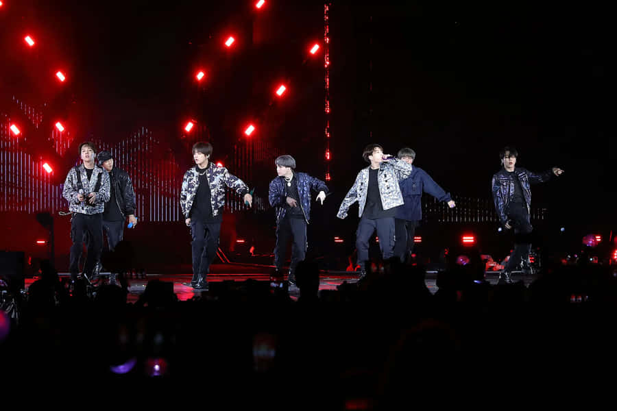 Bts Performing Live On Stage Wallpaper