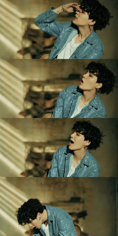 Bts Performs In Their Music Video, Captivating The Audience With Vibrant Colors And Dynamic Presence Wallpaper