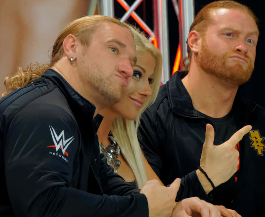 Buddy Murphy With Wesley Blake And Alexa Bliss Wallpaper