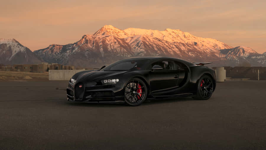 Bugatti Chiron Showcasing Its True Power And Elegance On The Road Wallpaper
