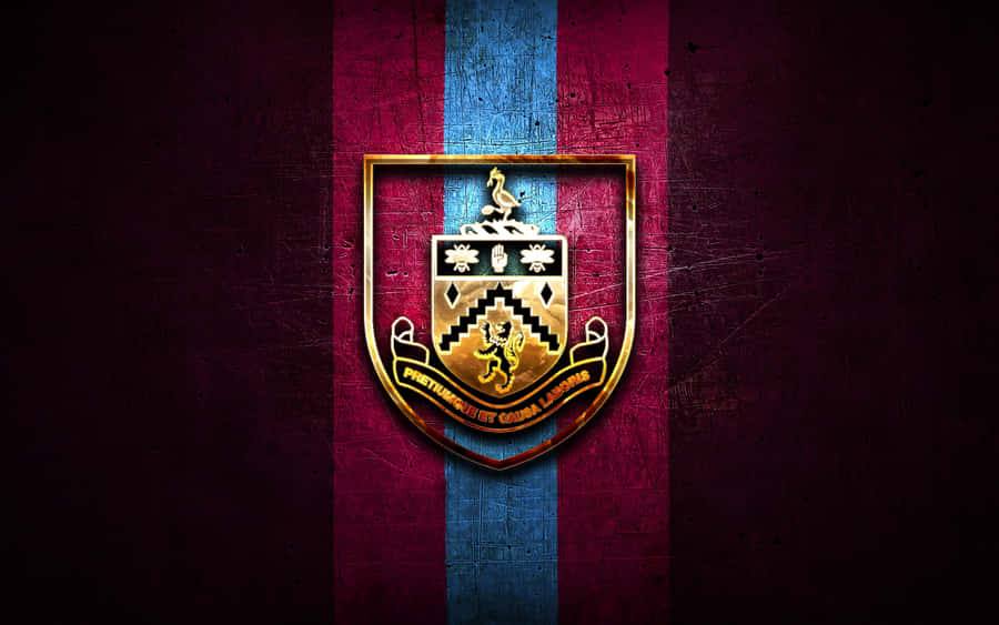 Burnley Fc Players Celebrating A Goal On The Field Wallpaper