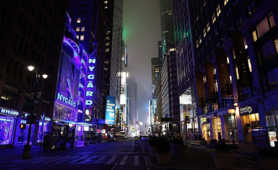 Bustling_ City_ Nightlife_ Street_ Scene.jpg Wallpaper