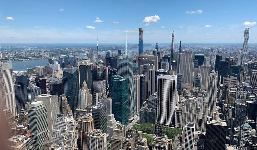 Bustling_ Metropolis_ Skyline_ View.jpg Wallpaper