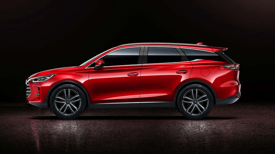 Byd Electric Car On The Road Wallpaper