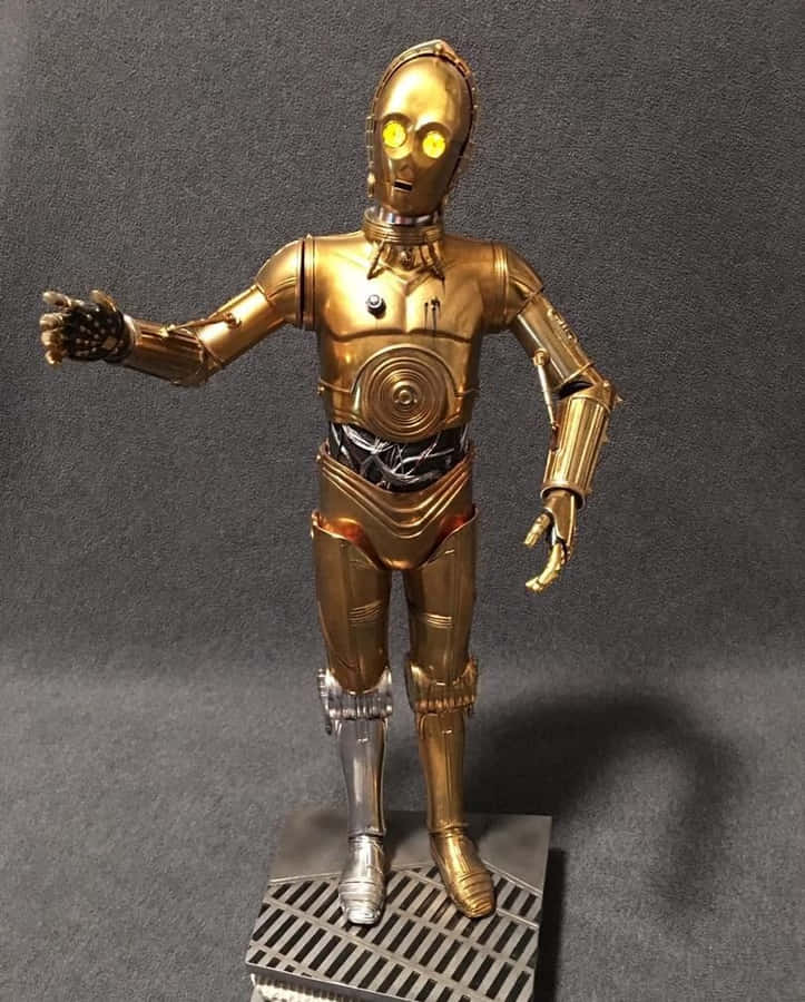 C-3po Standing Tall And Proud In A Futuristic Setting. Wallpaper