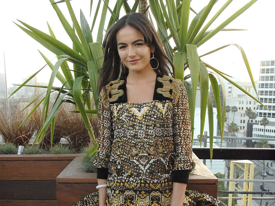 Camilla Belle Radiant In Red Wallpaper