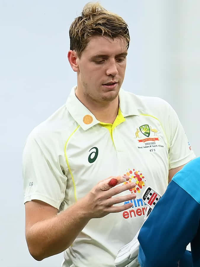 Captain Of The Grounds: Cameron Green In Action Wallpaper