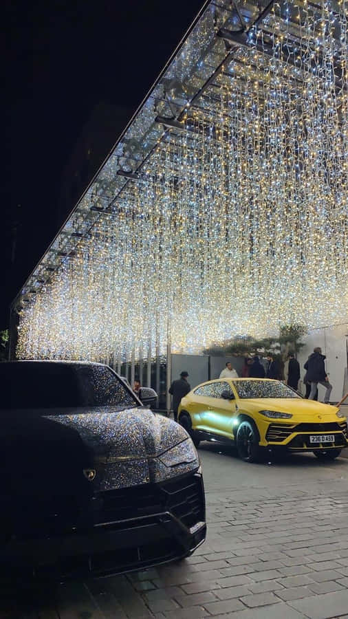 Caption: A Happy Family Driving In Their Comfortable Car Wallpaper