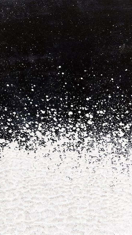 Caption: A Mesmerizing Pattern Of Black And White Dots Wallpaper