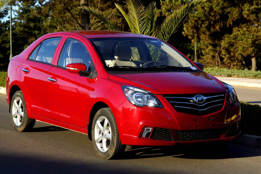 Caption: A Sleek, Modern Lifan Motorcycle On A Scenic Road Wallpaper