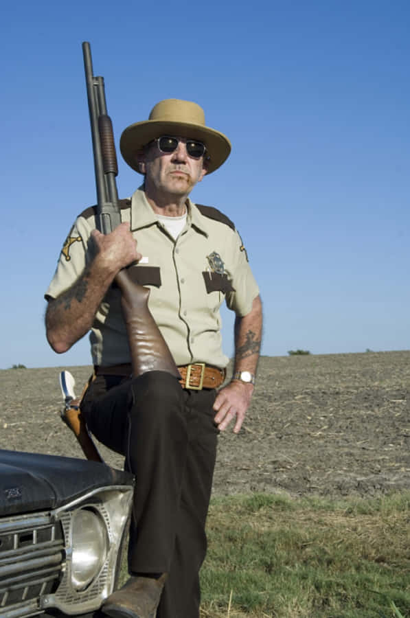 Caption: An Engaging Portrait Of R. Lee Ermey Wallpaper