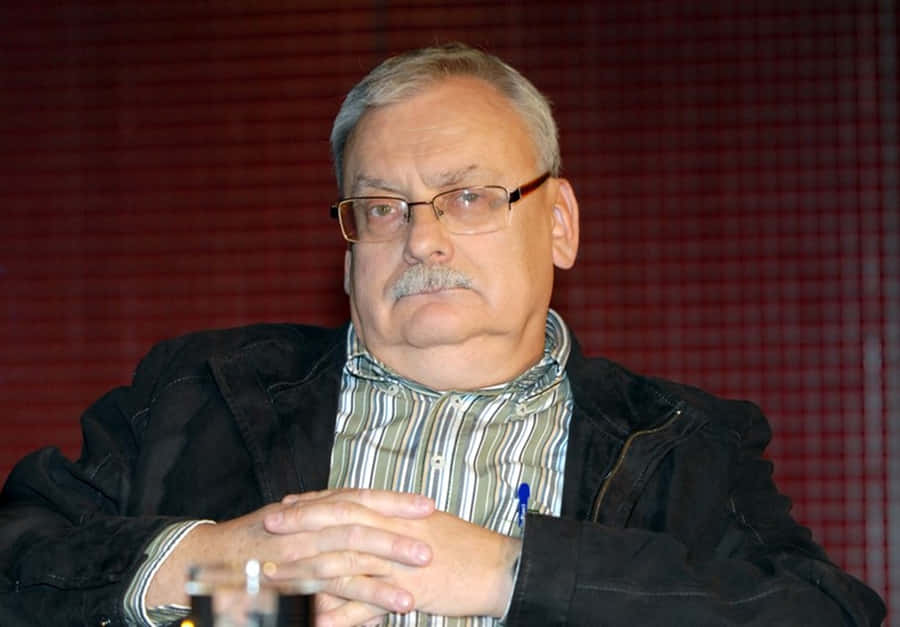 Caption: Andrzej Sapkowski, Renowned Author Of The Witcher Series Wallpaper