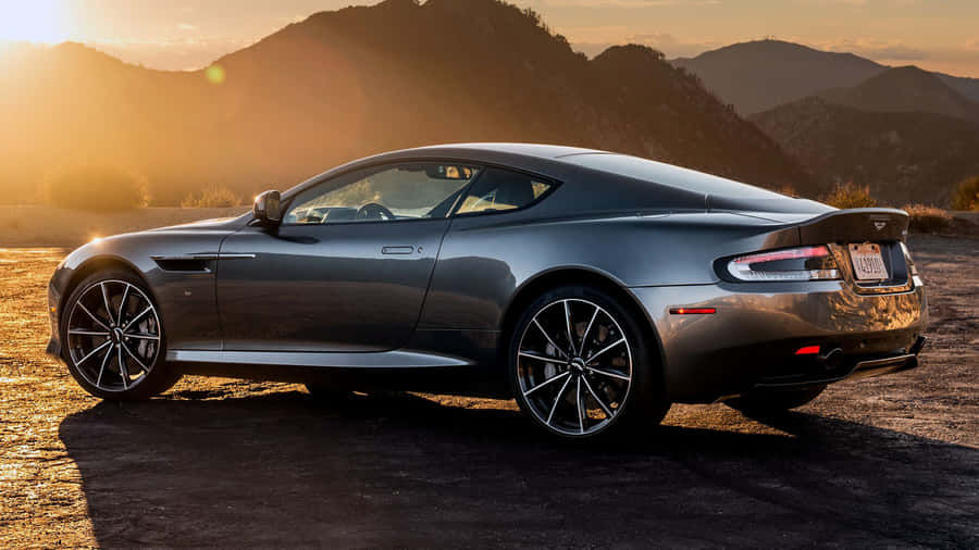 Caption: Aston Martin Db9 - Luxury And Performance On Display Wallpaper