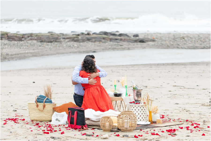 Caption: Beach Picnic Bliss Wallpaper