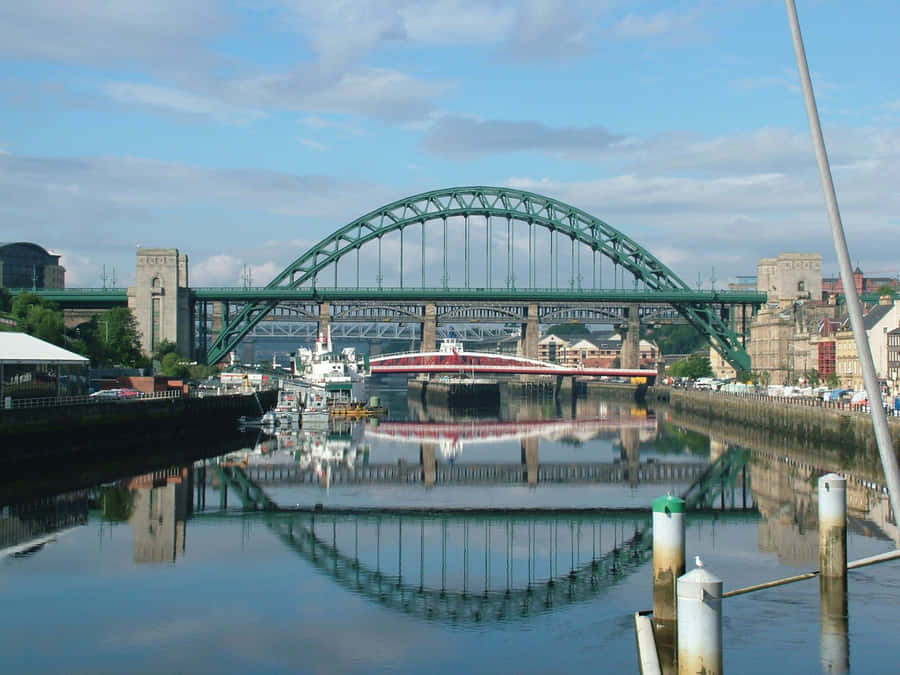 Caption: Breathtaking Skyline Of Newcastle Upon Tyne At Sunset Wallpaper