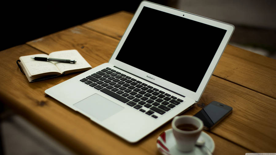 Caption: Corporate Team Discussing Business Strategy Wallpaper