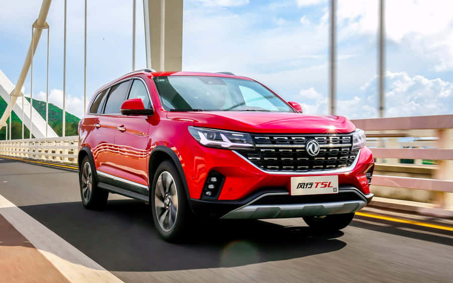 Caption: Dongfeng Vehicle Lineup On Display At An Exhibition Wallpaper