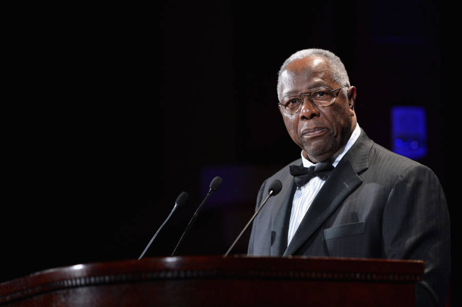Caption: Hank Aaron Delivering A Speech Wallpaper