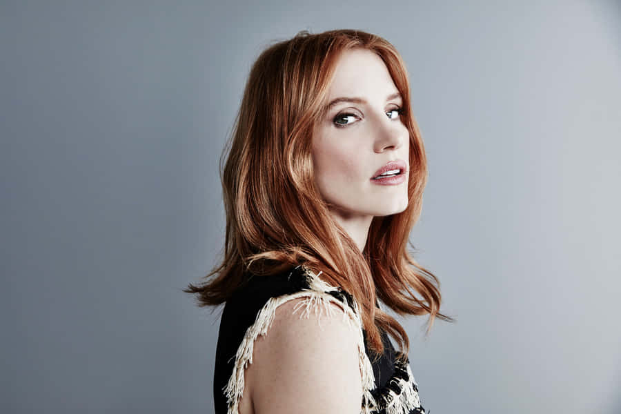 Caption: Jessica Chastain - Radiant Actress Wallpaper