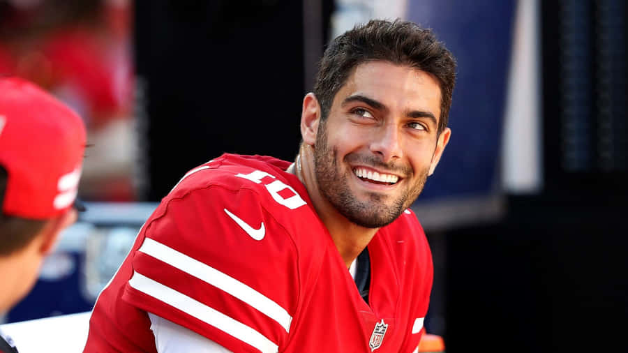 Caption: Jimmy Garoppolo In Action Wallpaper