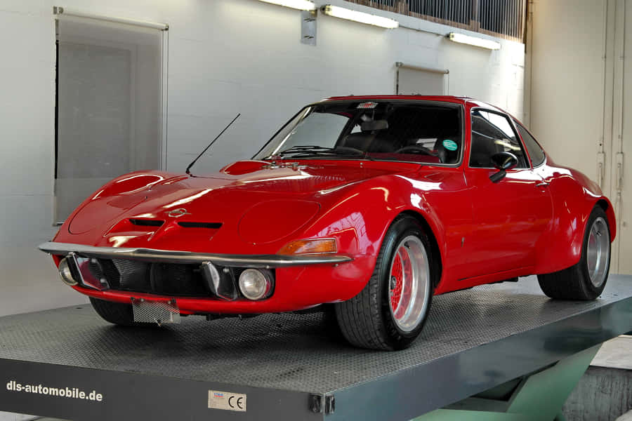 Caption: Luxurious Ride - The Opel Gt Wallpaper