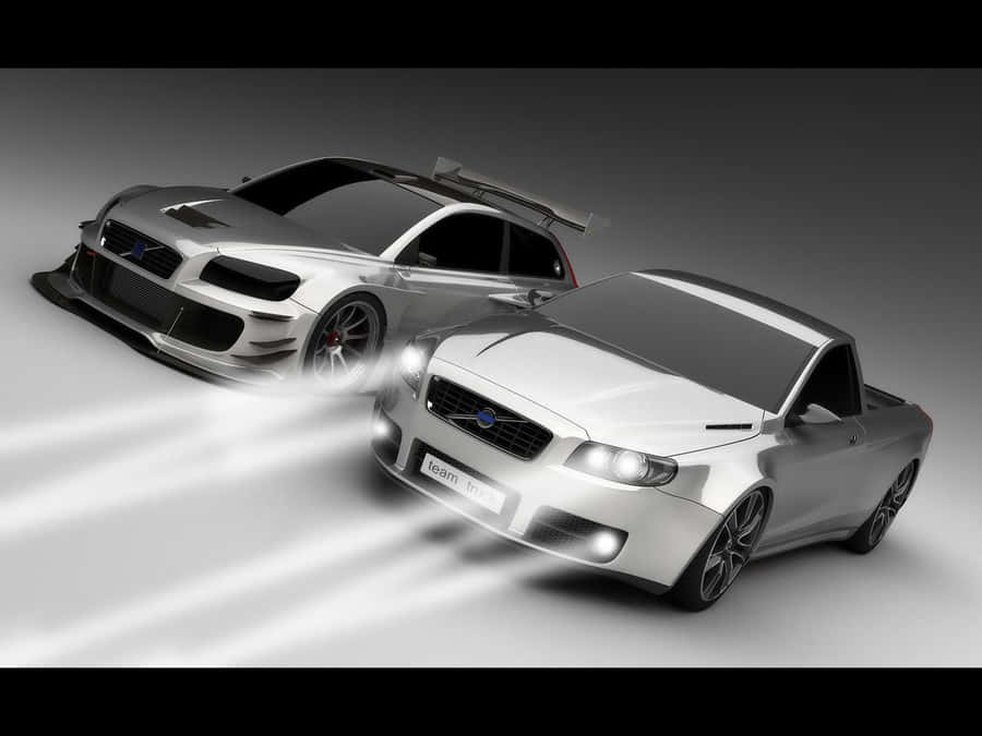 Caption: Luxurious Volvo V70 Cruising On A Highway Wallpaper